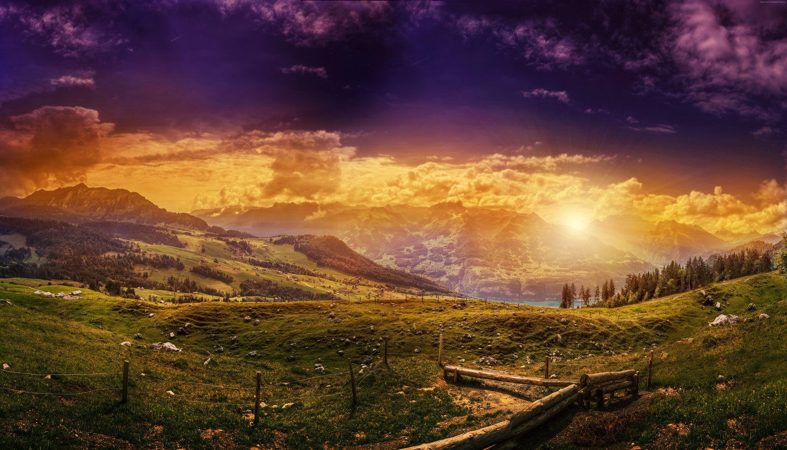 A view of a mountain range with a wooden bridge in the foreground (nature, mountain, morning, sunlight, desert)