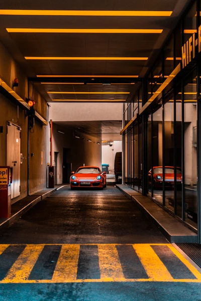 Scène nocturne d'une voiture de sport dans un garage urbain moderne