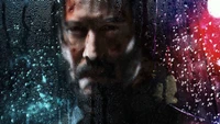 Keanu Reeves as John Wick: Intense Focus Amidst the Storm