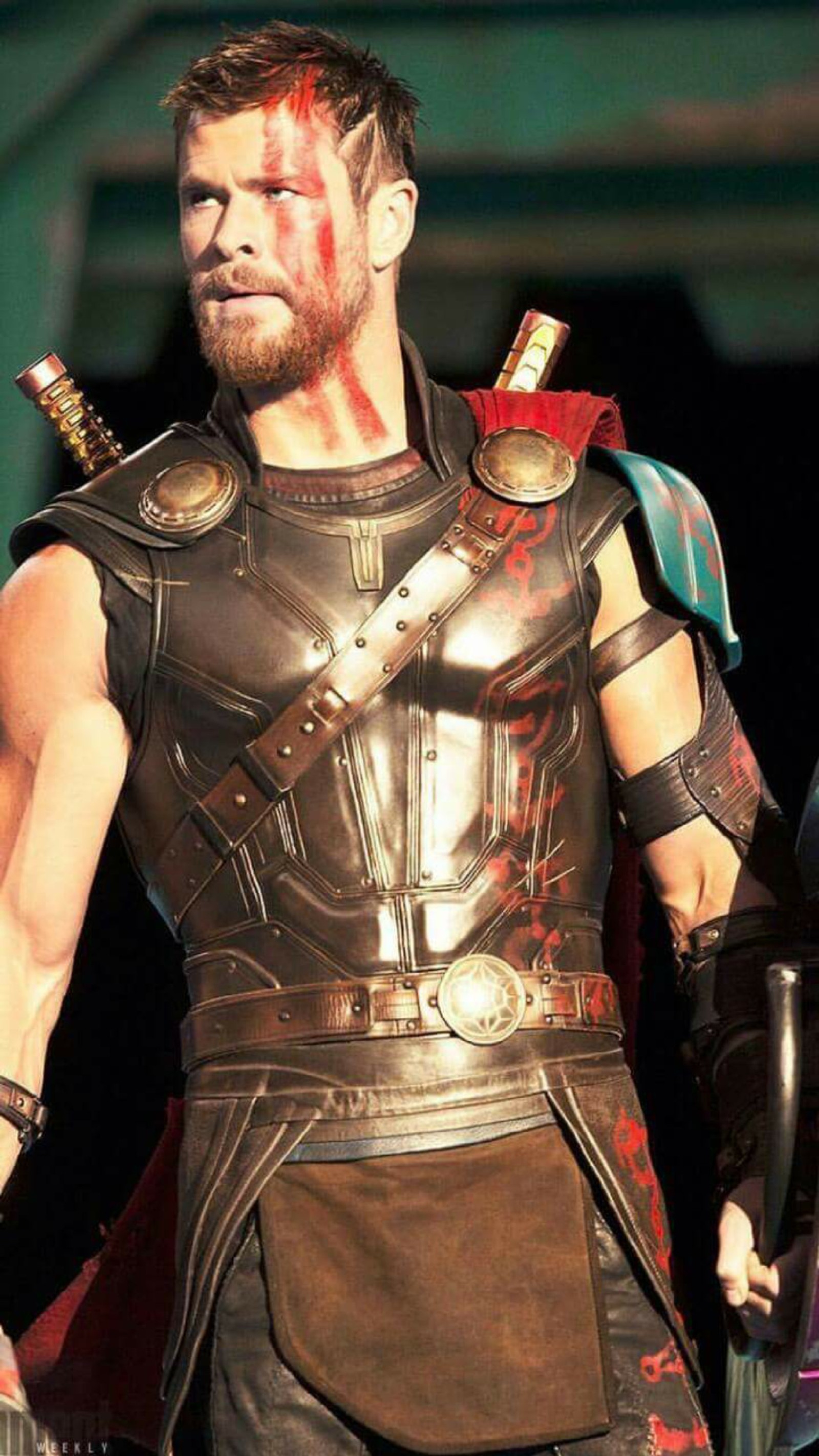 A close up of a man in armor with a sword (superhero, thor)