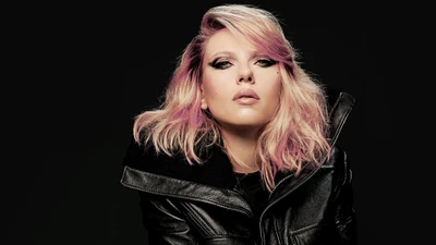 Scarlett Johansson in a striking portrait against a black background, showcasing bold makeup and stylish attire.