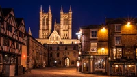 Lincoln Cathedral Illuminated at Night in Historic Town Square