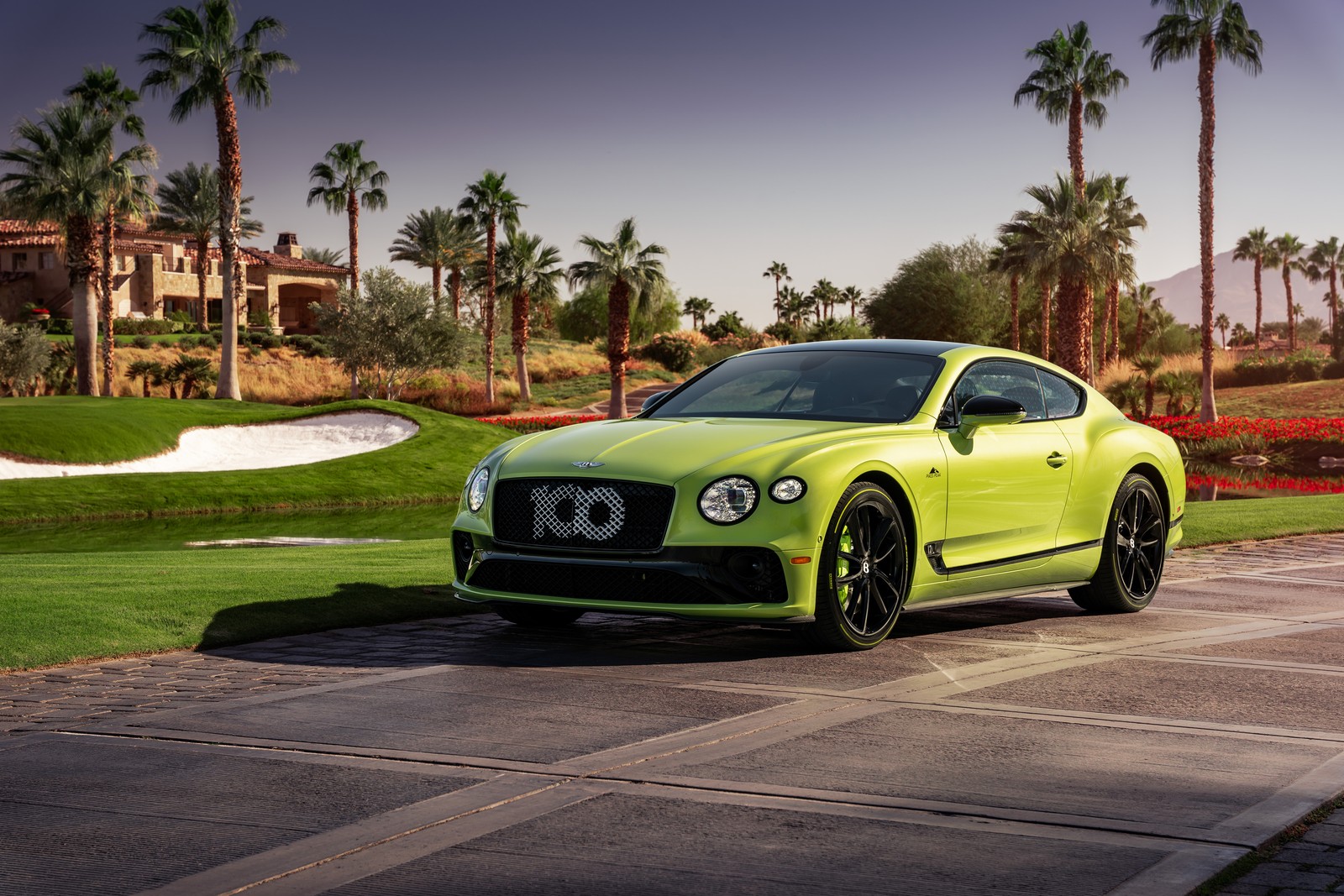 A green bentley car parked on a driveway near palm trees (bentley continental gt pikes peak, sports car, 2021, cars, 4k wallpaper)