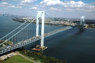 Bird's Eye View of a Cable-Stayed Suspension Bridge Over Waterway