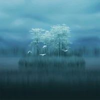 Serene landscape with frosted trees and flying birds over a calm water surface, enveloped in a blue mist.