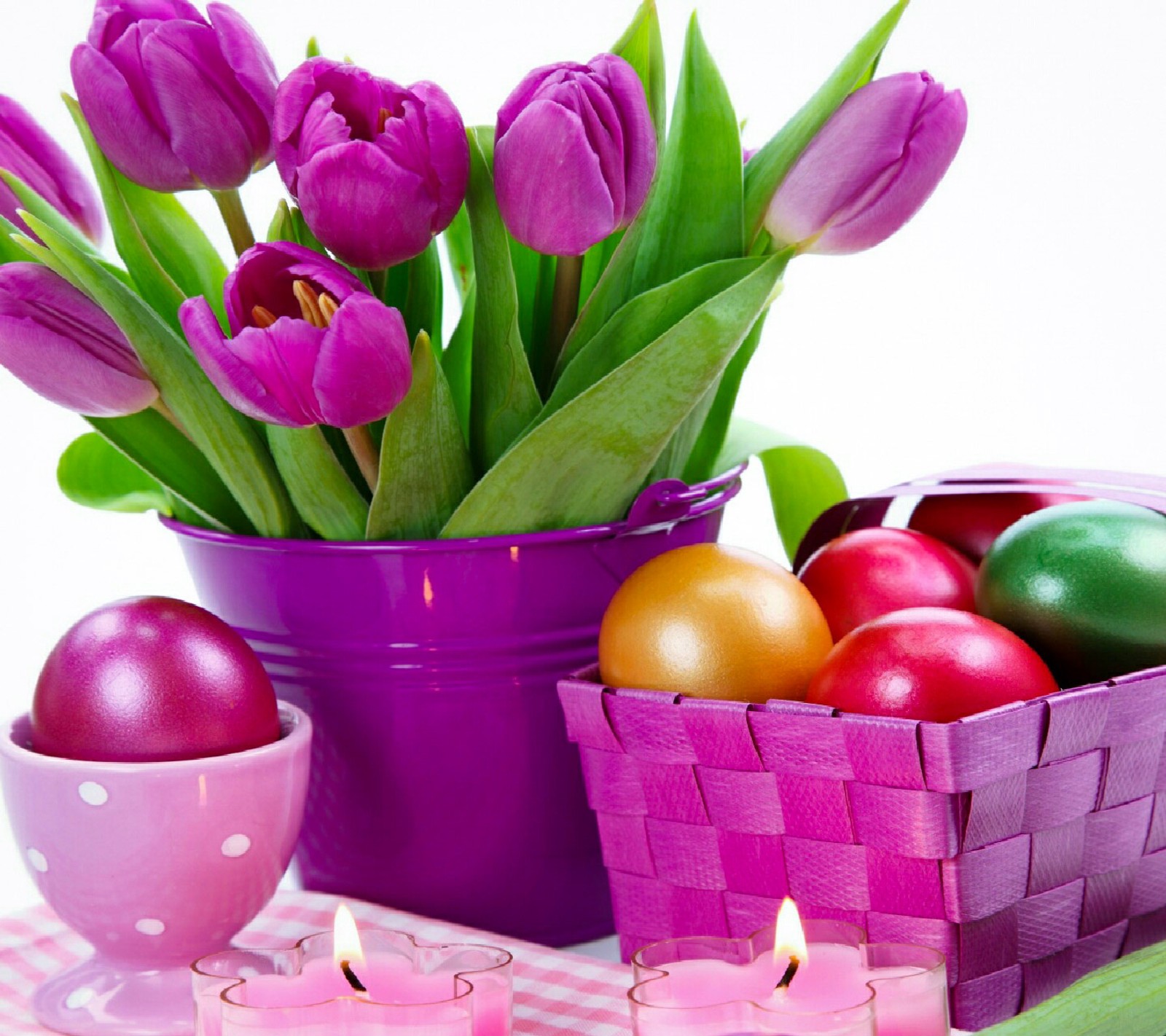 Purple buckets with purple flowers and candles on a table (nature, nice, romantic)