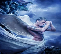 A celestial figure with white wings kneels in prayer, facing a majestic dragon against a dramatic, stormy sky.