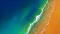 Tranquil Ocean Waves Lapping at a Sunlit Beach