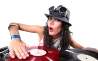 Stylish DJ Mixing Vinyl with Headgear and Sunglasses