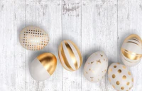 Elegant Easter Eggs on a Rustic Wooden Background