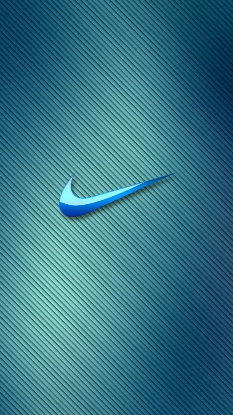 Крупный план синего логотипа nike на зеленом фоне (синий, логотип, nike)