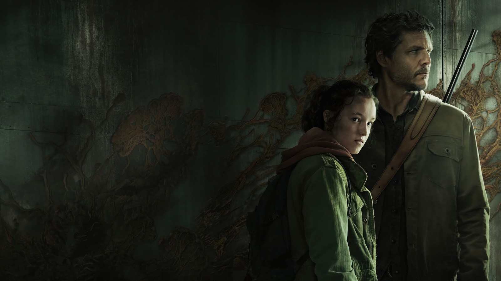 A man and a woman standing next to each other in a dark room (the last of us series, tv series, hbo max, the last of us)