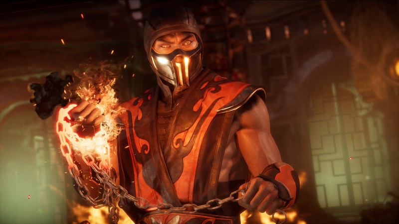 Мужчина в костюме скорпиона держит огонь в темной комнате (скорпион, mortal kombat 11, видеоигра)