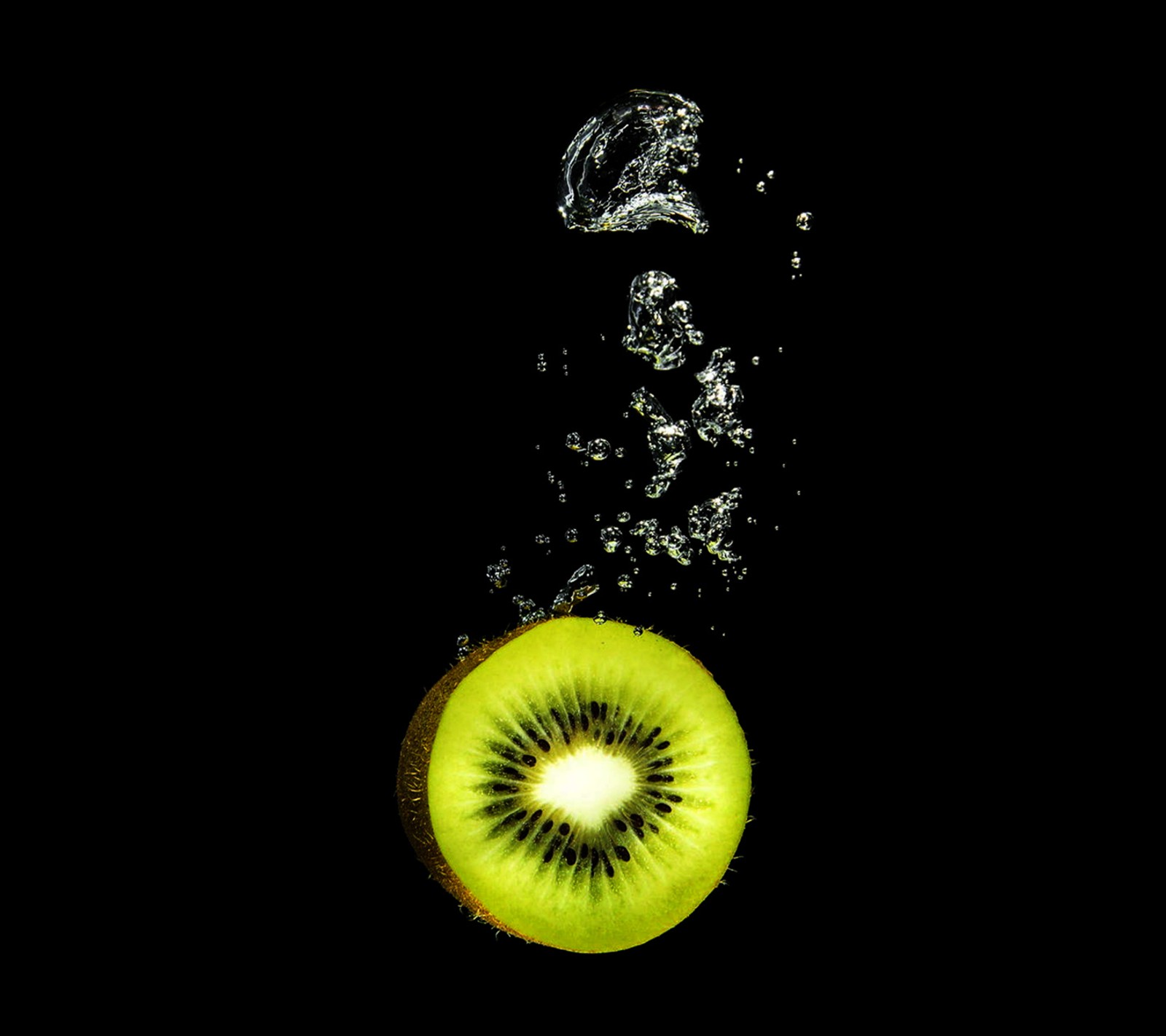 Araffe kiwi in the water with a splash of water (green, kiwi, summer)