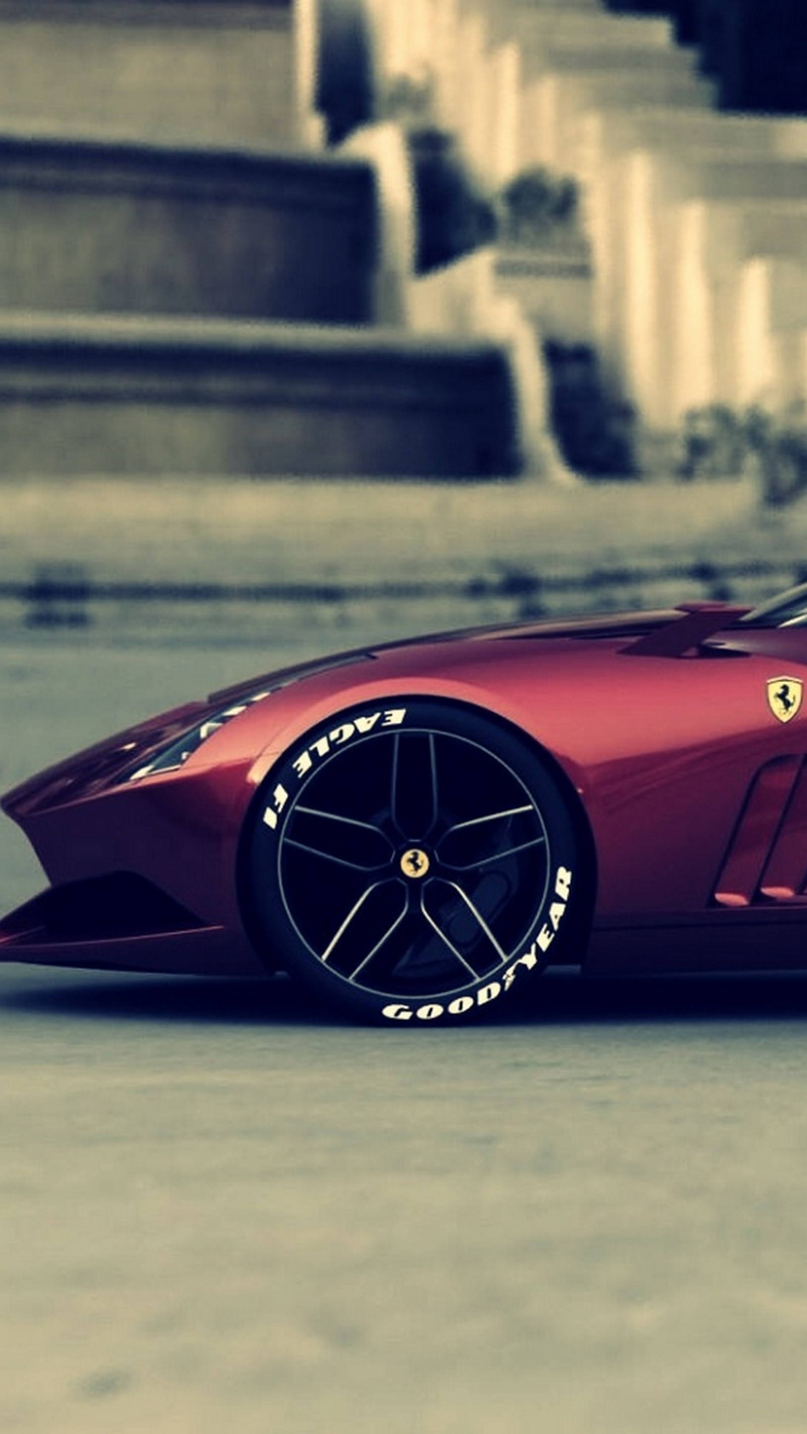 A close up of a red sports car parked on a street (auto ferrari, awesome, car, cool, nice)