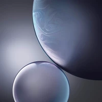 Colorful Spheres Reflecting Light: A Visual Tribute to iPhone Design