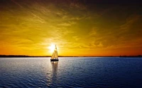 Sailboat Gliding into a Golden Sunset