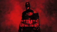 The Batman in a dark, red-hued atmosphere, embodying a brooding vigilante presence.