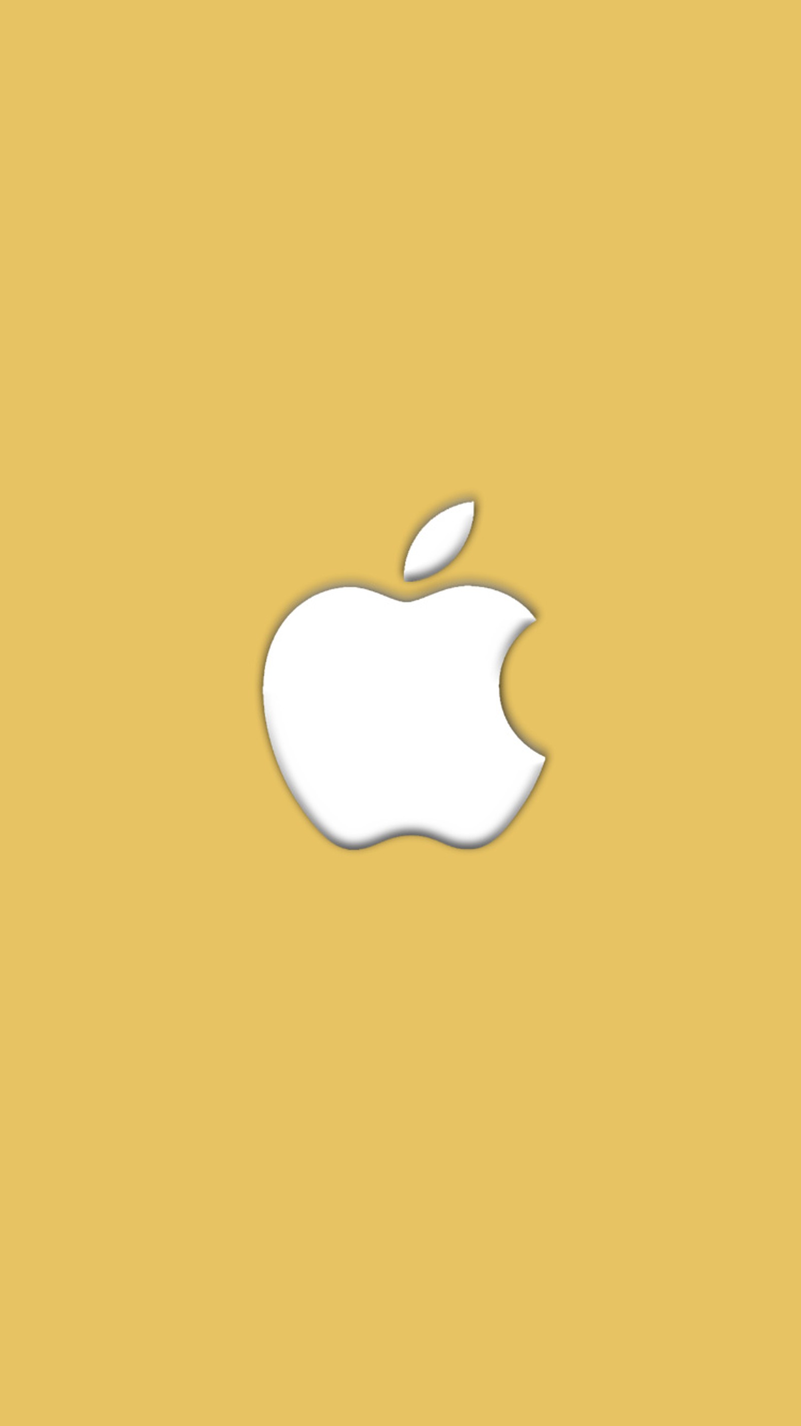 There is a white apple logo on a yellow background (gold, iphone 6)