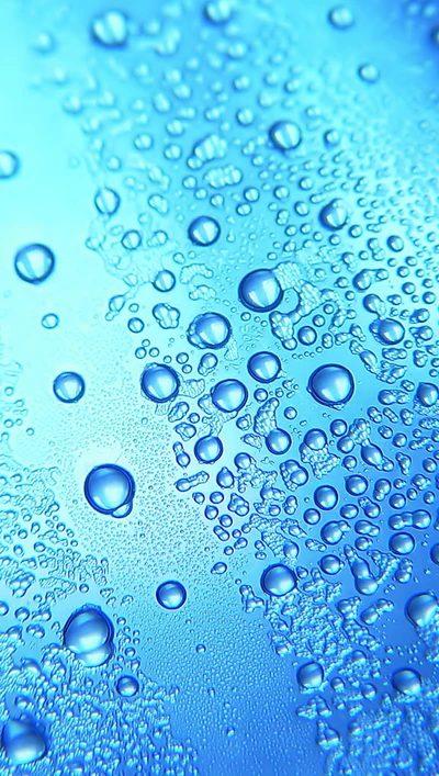 Blue Water Drops on a Surface