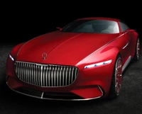 Sleek Red Luxury Car with Distinctive Grille and Futuristic Design