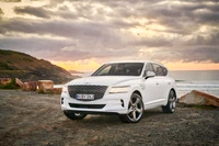 2021 Genesis GV80 in a coastal sunset setting