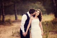 Romantic Wedding Kiss Amidst Nature