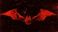 Dark Red Batman Symbol on Textured Background