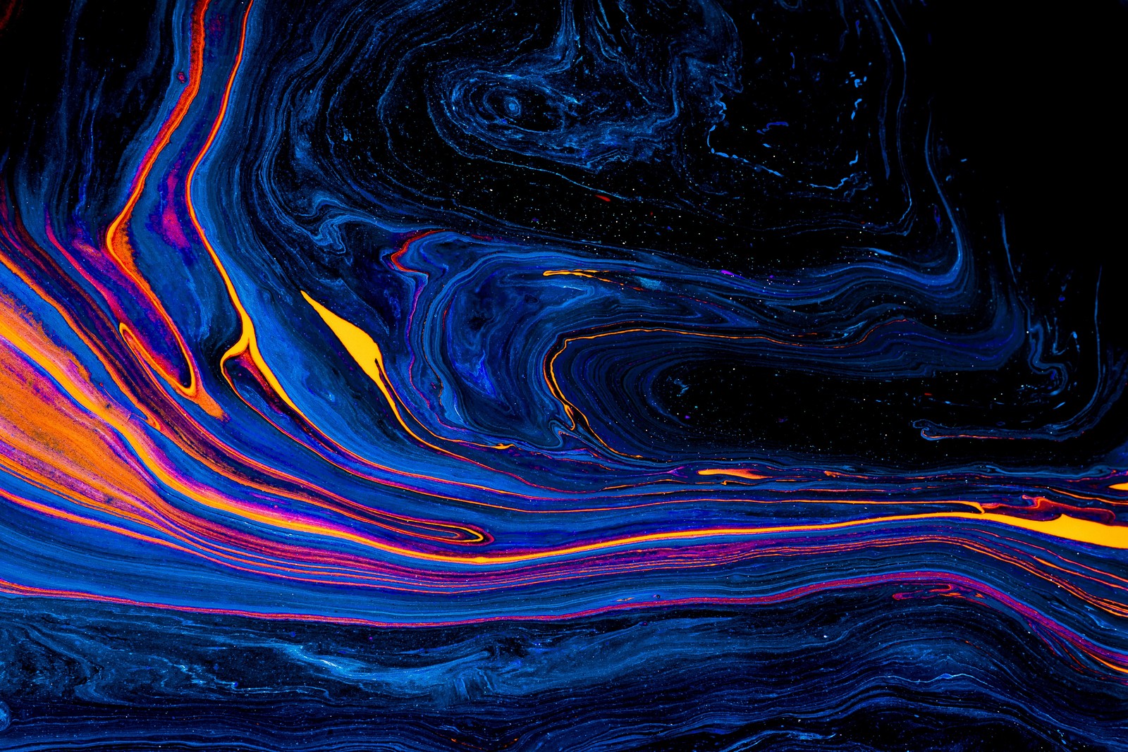 A close up of a colorful liquid painting on a black background (water, liquid, fluid, painting, art)