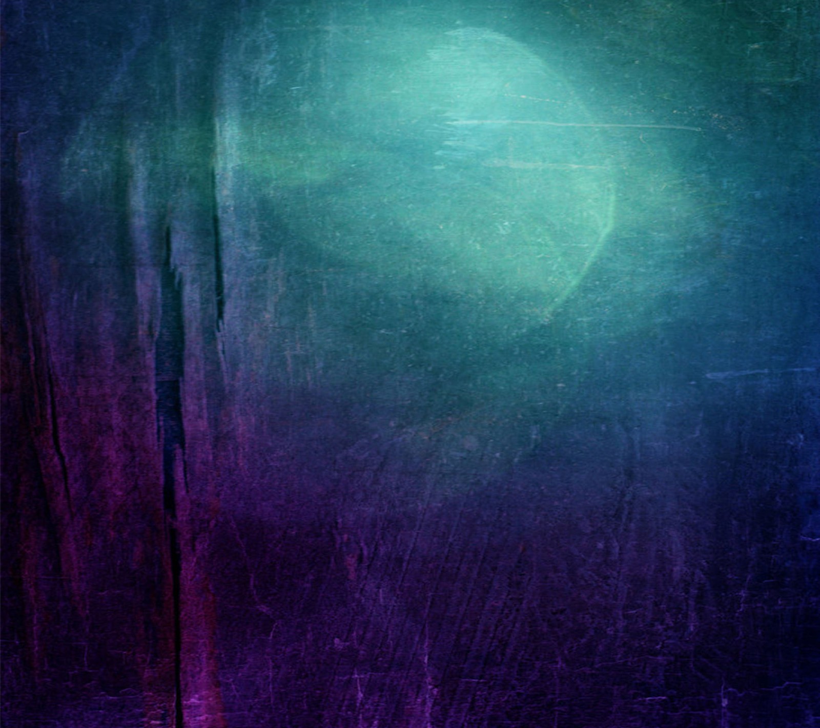 A close up of a green and purple background with a light (blue, dull)