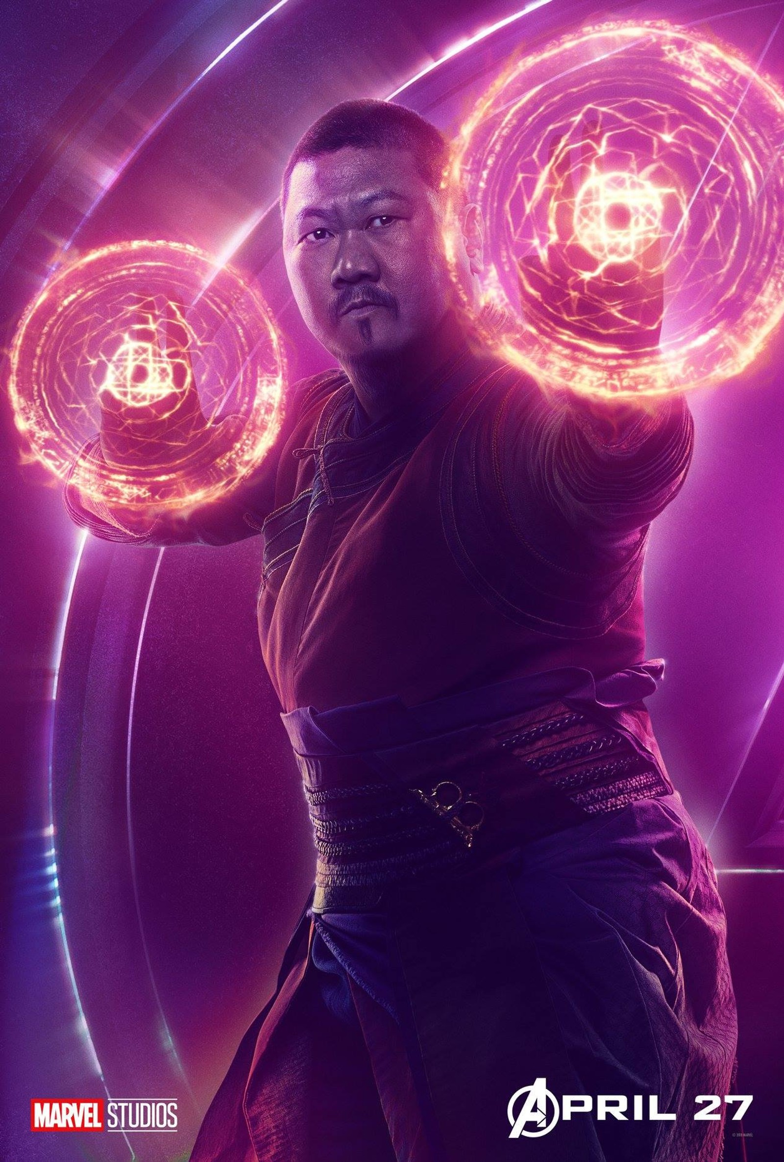 A close up of a man holding two glowing orbs in his hands (avengers, infinity war)