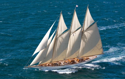 Elegant Schooner Under Full Sail on Open Waters