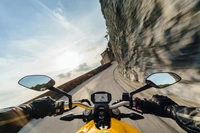 Dynamic Motorcycle Journey Along a Winding Road