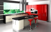 Diseño de cocina moderna con gabinetes elegantes, una encimera negra y acentos rojos vibrantes, que cuenta con una isla espaciosa y taburetes de bar contemporáneos.