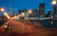 Étonnante skyline nocturne de San Francisco avec des reflets et un quai emblématique