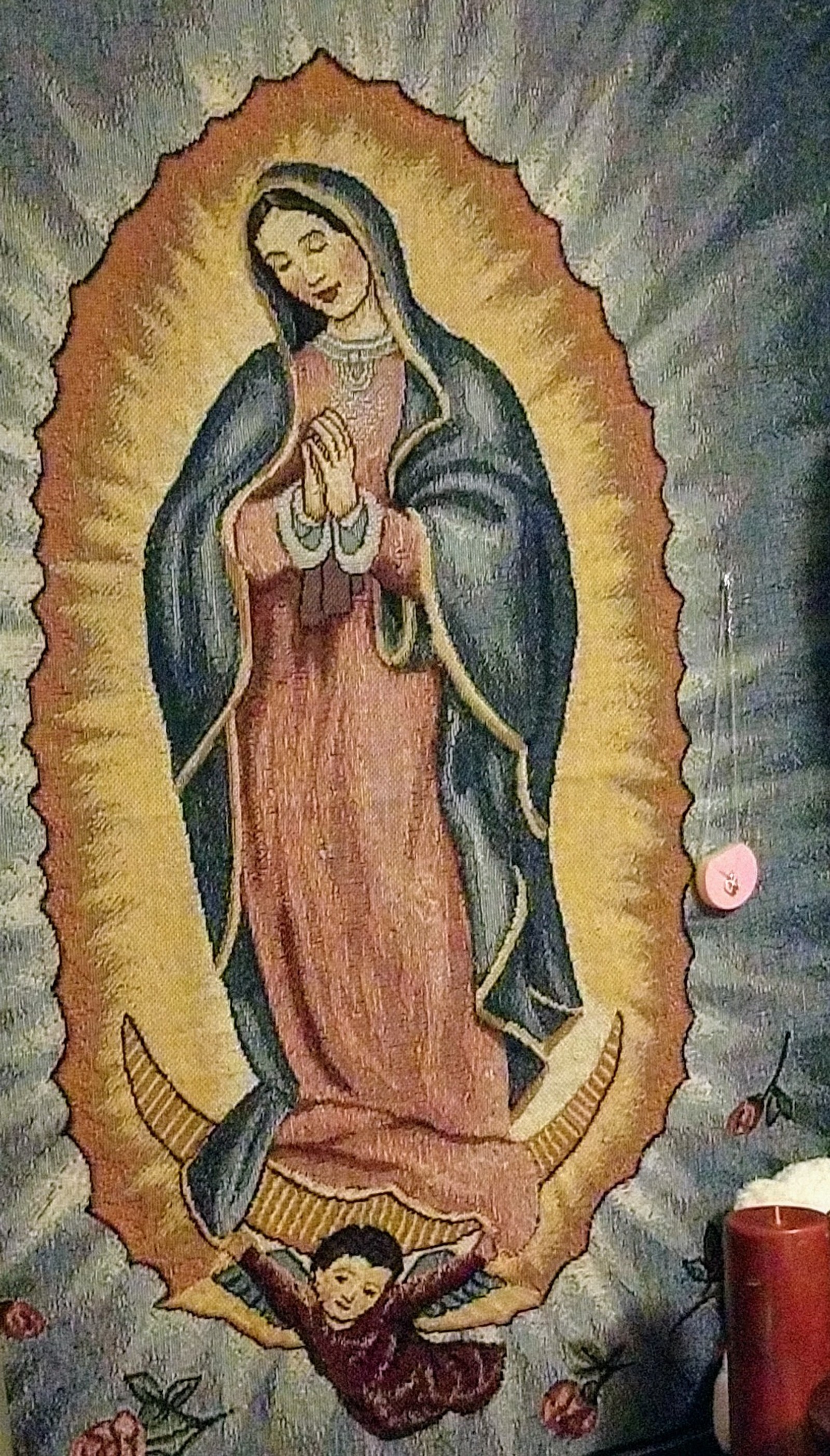 Arafed picture of a painting of the virgin mary with a baby jesus (guadalupe, saint)