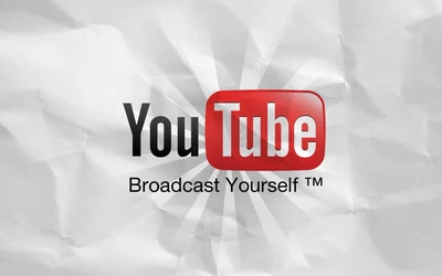 Логотип YouTube с девизом на смятом фоне