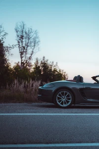 Porsche Carrera GT Cabrio unter klarem Himmel