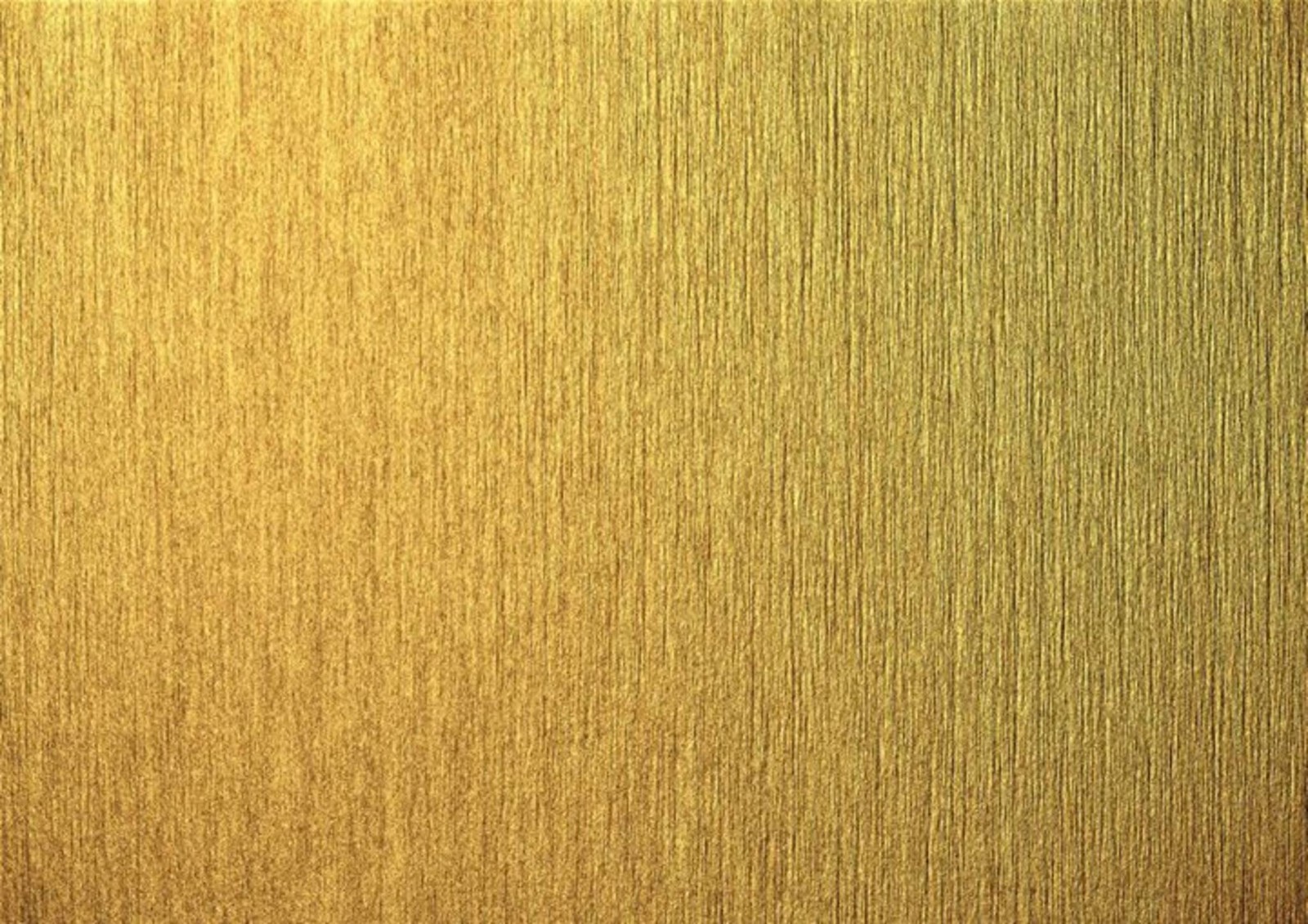 Un primer plano de una superficie de madera con un fondo marrón. (oro, pintura, textura, color metálico, amarillo)