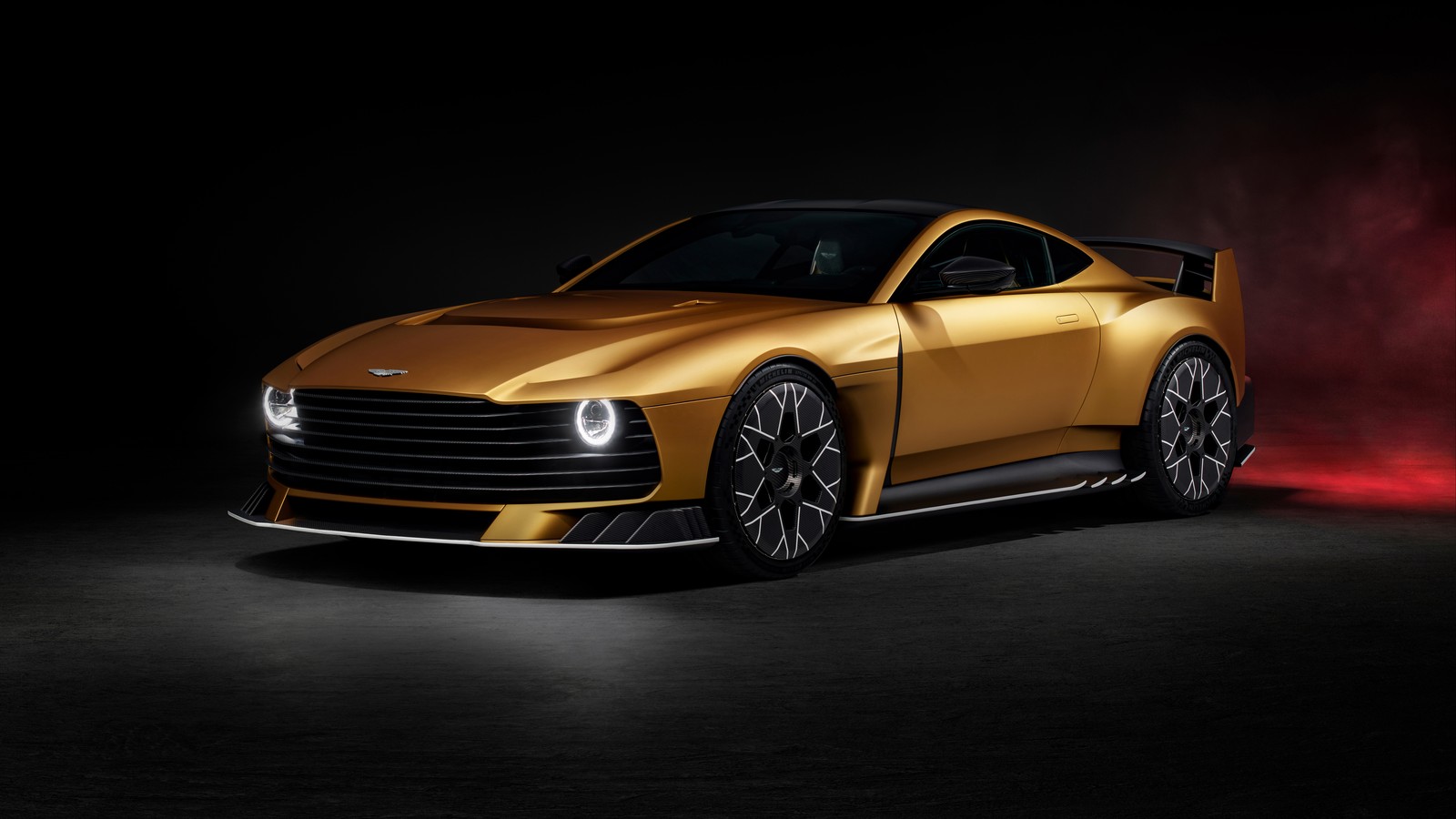 The new aston gt concept is shown in a dark room (aston martin valiant, 8k, 2024, 5k, luxury sports car)