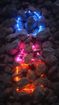 Rocas iluminadas: Un baile de llamas azul eléctrico y magenta