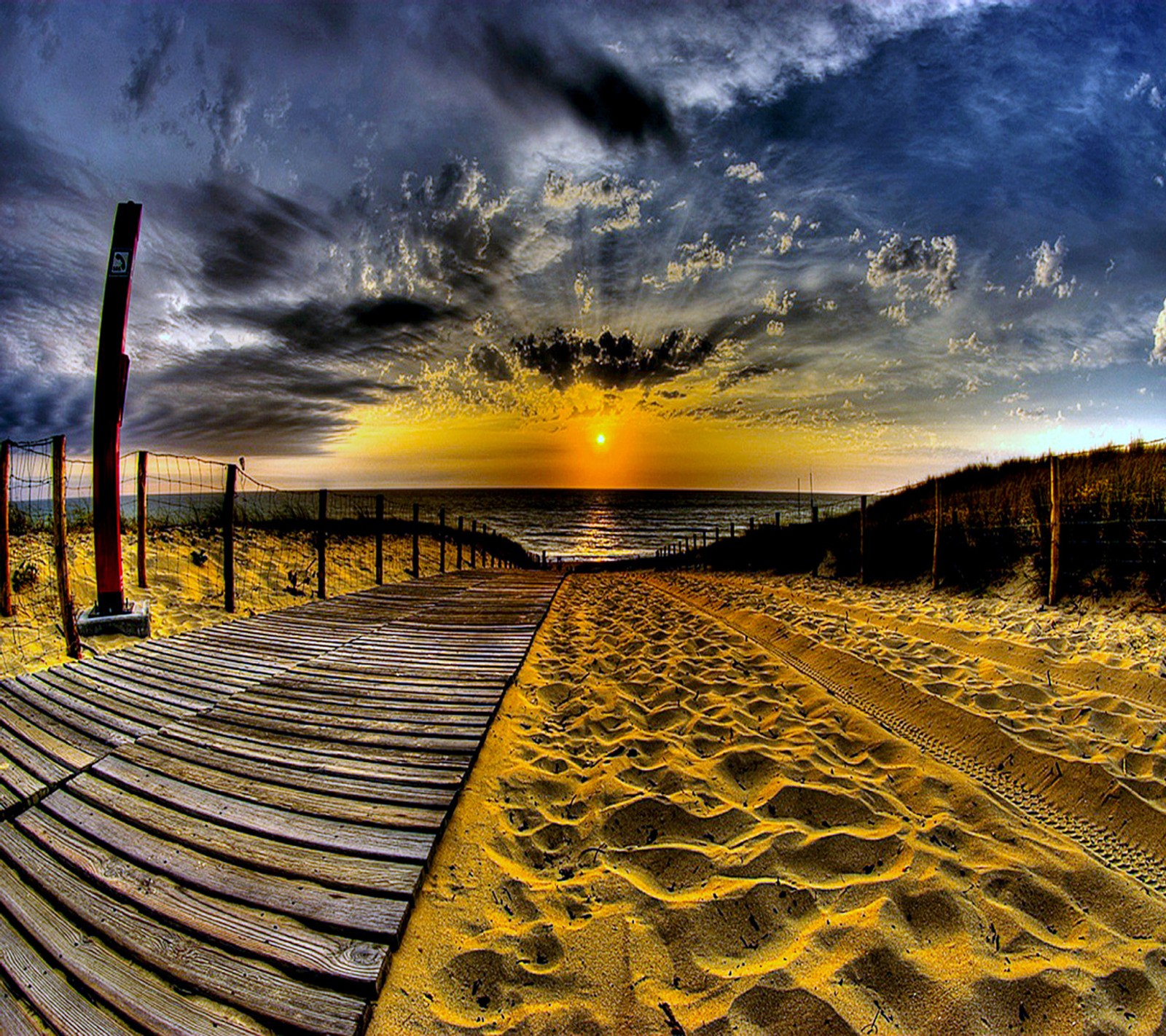 Arafed view of a boardwalk leading to the beach at sunset (nature, wallpaper)