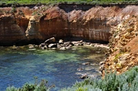 Scenic Wadi with Colorful Rock Formations and Clear Waters