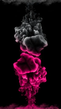 Vibrant Swirls of Black and Pink Ink in Motion