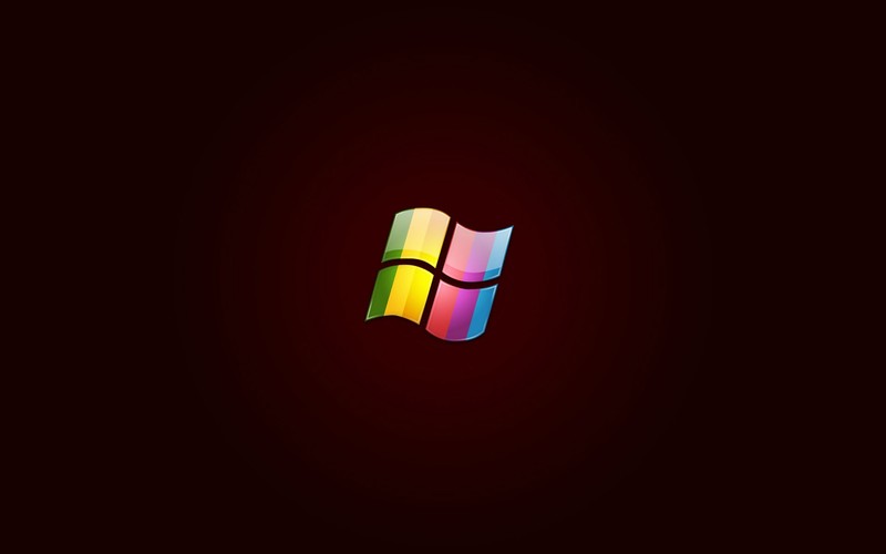 Крупный план логотипа windows на темном фоне (windows 7, microsoft windows, шрифт, дизайн, макросъемка)