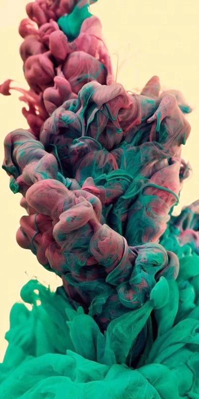 Vibrant Ink Swirls: A Fusion of Pink and Green Liquid Art