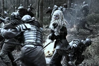 Monochrome Battle Scene in a Dark Forest