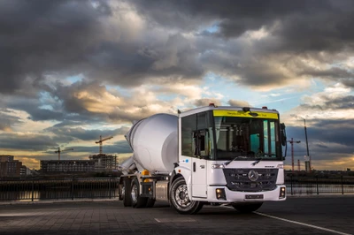 Mercedes-Benz Truck with a Concrete Mixer Against a Dramatic Sky