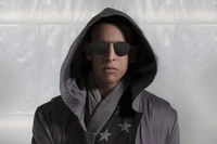 Stylish Reggaeton Artist in Sunglasses and Hooded Outerwear