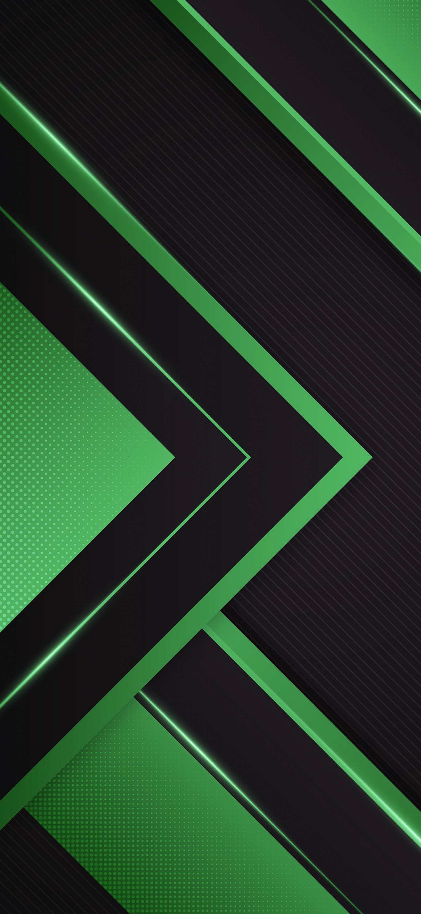 A close up of a green and black wall with a diagonal design (green, rectangle, triangle, parallels, magenta)